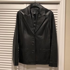 Nordstrom brand “ Frenchi” genuine lamb skin.